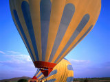 A Hot Air Ballon About to Fly Over the Cappadocia Landscape, Cappadocia, Nevsehir, Turkey Lámina fotográfica por Wes Walker