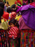 Women and Young Girl Watching the Zunil Easter Procession, Zunil, Guatemala Photographie par Jeffrey Becom