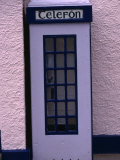 Phone Box in the Village of Gaeltacht in the West of Ireland, Connaught, Ireland Photographic Print by Greg Gawlowski