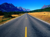 Road with Mountain Range in Distance Glacier National Park, Montana, USA Photographic Print by Rob Blakers
