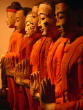 Statues of the Standing Buddha with His Disciples for Sale at Grand Antique in Bangkok, Thailand Photographic Print by Tom Cockrem