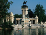 People Canoeing Past Parque Del Retiro, Madrid, Spain Photographic Print by Bill Wassman