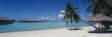 Lounge Chair under a Beach Umbrella, Moana Beach, Bora Bora, French Polynesia Reprodukcja zdjęcia autor Panoramic Images