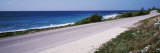 Road near the Sea, Caribbean Sea, Cayman Islands Photographic Print by Panoramic Images Road near the Sea, Caribbean Sea, Cayman Islands Photographic Print by Panoramic Images