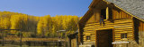 Cowboy Sitting on a Window of a Log Cabin, Ouray County, Ridgeway, Colorado, USA Photographic Print by Panoramic Images 