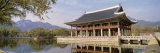 South Korea, Seoul, Kyongheru, View of Traditional Architecture on a Lake Photographic Print by Panoramic Images 