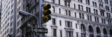 Traffic Light in Front of a Building, Wall Street, New York, USA Reprodukcja zdjęcia autor Panoramic Images Traffic Light in Front of a Building, Wall Street, New York, USA Reprodukcja zdjęcia autor Panoramic Images