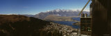 Tourists on the Balcony of a Resort, Queenstown, South Island, New Zealand Lámina fotográfica por Panoramic Images Tourists on the Balcony of a Resort, Queenstown, South Island, New Zealand Lámina fotográfica por Panoramic Images