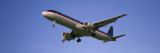 Airplane Flying Photographic Print by Panoramic Images 