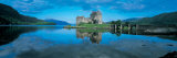 Reflection of a Castle in Water, Eilean Donan Castle, Loch Duich, Highlands, Scotland Photographic Print by Panoramic Images 