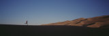 Runner Jogging in the Park, Great Sand Dunes National Monument, Colorado, USA Lámina fotográfica por Panoramic Images
