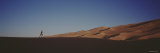 Runner Jogging in the Park, Great Sand Dunes National Monument, Colorado, USA Lámina fotográfica por Panoramic Images