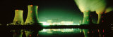Power Station Illuminated at Night, Three Mile Island, Pennsylvania, USA Fotoprint van Panoramic Images Power Station Illuminated at Night, Three Mile Island, Pennsylvania, USA Fotoprint van Panoramic Images