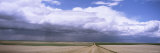 Storm Clouds over a Country Road, Alberta, Canada Photographic Print by Panoramic Images 