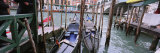 Gondolas Moored near a Bridge, Rialto Bridge, Grand Canal, Venice, Italy Photographic Print by Panoramic Images 