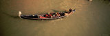 Tourists in a Gondola, Venice, Italy Photographic Print by Panoramic Images 