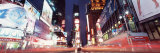 Sign Boards Lit Up at Night, Times Square, New York, USA Photographic Print by Panoramic Images 