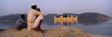 Two Men Sitting at a Lakeside with a Palace in the Background, Jal Mahal, Jaipur, Rajasthan, India Lámina fotográfica por Panoramic Images Two Men Sitting at a Lakeside with a Palace in the Background, Jal Mahal, Jaipur, Rajasthan, India Lámina fotográfica por Panoramic Images
