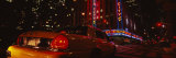 Car on a Road, Radio City Music Hall, Rockefeller Center, Manhattan, New York, USA Photographie par Panoramic Images 