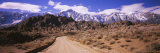 Dirt Road Passing through an Arid Landscape, Lone Pine, Californian Sierra Nevada, California, USA Lámina fotográfica por Panoramic Images Dirt Road Passing through an Arid Landscape, Lone Pine, Californian Sierra Nevada, California, USA Lámina fotográfica por Panoramic Images