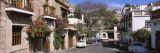 Cars Parked on Both Sides of a Road, Taxco, Mexico Reprodukcja zdjęcia autor Panoramic Images Cars Parked on Both Sides of a Road, Taxco, Mexico Reprodukcja zdjęcia autor Panoramic Images