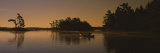 Silhouette of a Person in a Canoe on a Lake, Kejimkujik Lake, Nova Scotia, Canada Lámina fotográfica por Panoramic Images Silhouette of a Person in a Canoe on a Lake, Kejimkujik Lake, Nova Scotia, Canada Lámina fotográfica por Panoramic Images