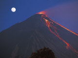 Siau Volcano Erupting with Moon Behind, N Sulawesi, Indonesia Prints by Jurgen Freund