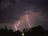 Lightning Over Floodlit Building, Pusztaszer, Hungary Posters by Bence Mate