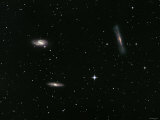 The Leo Triplet, Also Known as the M66 Group, is a Small Group of Galaxies in the Constellation Leo Lámina fotográfica por Stocktrek Images The Leo Triplet, Also Known as the M66 Group, is a Small Group of Galaxies in the Constellation Leo Lámina fotográfica por Stocktrek Images