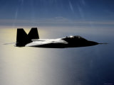 Over California, an F/A-22 Raptor Files a Training Mission Here Photographie par Stocktrek Images 