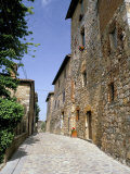 Oldest Building in the Best Preserved Fortified Medieval Village in Tuscany Photographie par Pearl Bucknall