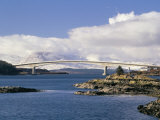 Skye Bridge Across Kyle Akin with Snow on the Mountains of Skye in Late Winter, Highland Region, UK Photographie par Pearl Bucknall