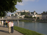 Cityscape with River Salzach and Riverside Walk, Salzburg, Austria Photographic Print by Charles Bowman