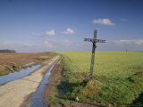 Christian Calvary Beside Muddy Track and Fields in Landscape Near Agincourt, France Photographic Print by Michael Busselle