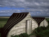Upturned Boats Used as Sheds, Lindisfarne (Holy Island), Northumbria, England Photographic Print by Jean Brooks
