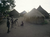 Batour Village, Anouak (Anuak) Ethnic Group, on Shores of Lake Tata, Ilubador State, Ethiopia Photographic Print by Bruno Barbier