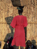 Back View of a Nuer Woman Carrying a Wicker Cradle or Crib on Her Head, Ilubador State, Ethiopia Photographic Print by Bruno Barbier