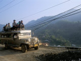 Truck Carrying Passengers on the Roof, Banaue, Island of Luzon, Philippines, Southeast Asia Photographic Print by Bruno Barbier