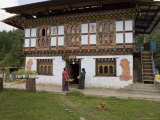 Phallus Symbols on House to Ward off Evil Spirits, Bumthang Valley, Bhutan Photographic Print by Angelo Cavalli