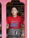 Young Shop Owner, Village of Wangdue Phodrang, Bhutan Photographic Print by Angelo Cavalli