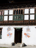 Phallus Symbols on House to Ward off Evil Spirits, Paro, Bhutan Photographic Print by Angelo Cavalli