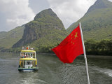 Cruise Boat with Chinese Flag on Li River Between Guilin and Yangshuo, Guilin, China Photographic Print by Angelo Cavalli