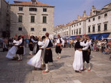 Tourist Board Folk Dancers in Lusa Square, Dubrovnik, Dalmatia, Croatia Photographic Print by Peter Higgins