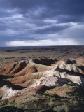Eroded Rocks Under an Overcast Stormy Sky, the Painted Desert, Arizona, USA Photographic Print by Tony Gervis