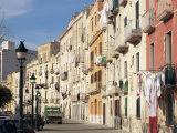 House Fronts and Laundry, Trapani, Sicily, Italy Photographic Print by Ken Gillham