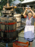 A Local Winemaker Pressing Her Grapes at the Cantina, Torano Nuovo, Abruzzi, Italy Fotografie-Druck von Michael Newton