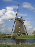 Canal and Windmill at Kinderdijk, Unesco World Heritage Site, Holland Photographic Print by Gavin Hellier