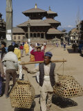 Nepali Man Carrying Produce in Wicker Baskets Photographic Print by James Green Nepali Man Carrying Produce in Wicker Baskets Photographic Print by James Green