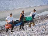 Fisherman Carrying Fish up Shingle Beach, Le Hourdel, Cote Picardie, Picardy, France Photographic Print by David Hughes