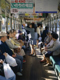 Passengers, Interior a Public Tram, Nagasaki, Island of Kyushu, Japan Photographic Print by Christopher Rennie